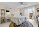 Bedroom with balcony access, complemented by elegant furnishings and natural light at 7430 Sunshine Skyway S Ln # 402, St Petersburg, FL 33711