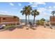 Rooftop deck overlooking the water with chairs and palm trees creating a relaxing ambiance at 7430 Sunshine Skyway S Ln # 402, St Petersburg, FL 33711