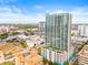 Beautiful aerial shot showcasing a modern high-rise building with a rooftop pool and cityscape at 777 N Ashley Dr # 2807, Tampa, FL 33602