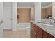 Updated bathroom features a shower-over-tub and a granite-topped vanity with lots of storage at 777 N Ashley Dr # 2807, Tampa, FL 33602