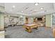 Resident lounge with a billiards table, seating, and a TV area at 777 N Ashley Dr # 2807, Tampa, FL 33602