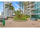 Outdoor courtyard with a sitting area, tropical foliage, and city views at 777 N Ashley Dr # 2807, Tampa, FL 33602