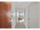Inviting hallway leads to a stylish living area with city views and modern finishes at 777 N Ashley Dr # 2807, Tampa, FL 33602