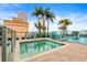 Rooftop hot tub and sundeck with palm trees and city views at 777 N Ashley Dr # 2807, Tampa, FL 33602