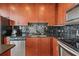 A kitchen features stainless appliances, including a dishwasher, oven, microwave, and lots of cabinet space at 777 N Ashley Dr # 2807, Tampa, FL 33602