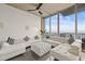 Contemporary living space with open layout, floor-to-ceiling windows and modern furnishings at 777 N Ashley Dr # 2807, Tampa, FL 33602