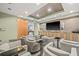 Condo lounge with comfortable seating, a TV, and views of the city at 777 N Ashley Dr # 2807, Tampa, FL 33602