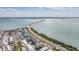 Panoramic aerial view featuring a coastline road with surrounding buildings and ocean views at 9 Forbes Pl # 504, Dunedin, FL 34698