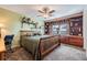 Bedroom with comfortable furnishings, carpet floor, and built in cabinets at 9 Forbes Pl # 504, Dunedin, FL 34698