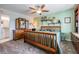 Bedroom with comfortable furnishings, carpet floor, and built in cabinets at 9 Forbes Pl # 504, Dunedin, FL 34698