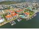 An elevated view of a multi-Gathering residential complex and boat docks, near highway and mangroves at 1038 Bellasol Way # 202, Apollo Beach, FL 33572