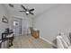 A well-lit dining area with a coffee bar and sliding glass doors leading to the outside at 1038 Bellasol Way # 202, Apollo Beach, FL 33572