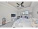 Bright main bedroom featuring balcony access and modern ceiling fan for ultimate comfort and relaxation at 1038 Bellasol Way # 202, Apollo Beach, FL 33572