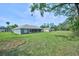 Expansive backyard offering plenty of space for outdoor activities and future landscaping opportunities at 12037 Conway St, Spring Hill, FL 34609