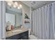 Tastefully appointed bathroom showcasing sleek vanity with granite countertops at 12037 Conway St, Spring Hill, FL 34609