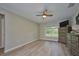 Neutral toned bedroom with luxury vinyl plank flooring and modern dressers at 12037 Conway St, Spring Hill, FL 34609