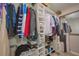 Walk-in closet with custom built-in shelving and ample storage space at 12037 Conway St, Spring Hill, FL 34609