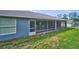 Close up on spacious screened in lanai perfect for enjoying the outdoors without insects at 12037 Conway St, Spring Hill, FL 34609