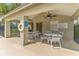Relax in the shade under the pool cabana while enjoying time with friends and Gathering at 1205 Hounds Run, Safety Harbor, FL 34695
