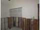 Bedroom with a closet and exposed studs, ready for remodeling at 125 11Th Ave, Indian Rocks Beach, FL 33785