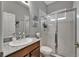 Bright bathroom featuring a glass shower and granite sink at 12903 49Th E Ln, Parrish, FL 34219