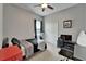 Cozy bedroom with ceiling fan and closet at 12903 49Th E Ln, Parrish, FL 34219