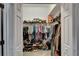 Spacious walk-in closet with ample shelving, hanging space, and shoe storage for organization at 12903 49Th E Ln, Parrish, FL 34219