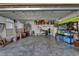 Large, unfinished garage with ample storage and room for projects at 12903 49Th E Ln, Parrish, FL 34219
