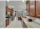 Kitchen with stainless steel appliances, granite countertops and a tile backsplash at 12903 49Th E Ln, Parrish, FL 34219