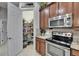 Walk-in kitchen pantry with shelves full of food at 12903 49Th E Ln, Parrish, FL 34219