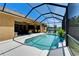 Enjoy this screened-in pool and extended deck with ample space for entertaining and relaxing at 12903 49Th E Ln, Parrish, FL 34219