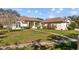 Attractive single-Gathering home with manicured lawn and walkway at 13750 Dowling Ln, Odessa, FL 33556