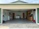 Spacious two-car garage with washer, dryer, sink and plenty of storage at 14264 Page Ave, Largo, FL 33774