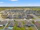 Community aerial view showcases houses with well-maintained yards in a well-planned neighborhood at 16302 Vine Cliff Ave, Hudson, FL 34667