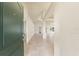 View of the open foyer with tile flooring leading to the main living areas at 16302 Vine Cliff Ave, Hudson, FL 34667