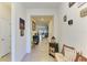 Inviting entryway with stylish decor, and a glimpse into the living area at 16934 Oval Rum Dr, Wimauma, FL 33598