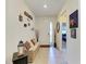 Inviting entryway with bench seating, decorative accents, and natural light at 16934 Oval Rum Dr, Wimauma, FL 33598