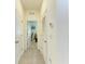 Hallway showing rooms in the home at 16934 Oval Rum Dr, Wimauma, FL 33598