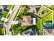 Bird's eye view showcasing a home with backyard, well manicured lawn, solar panels, privacy fence and pool at 18734 Burndall Ct, Land O Lakes, FL 34638