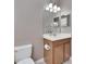 Bathroom with vanity, cabinet and toilet at 18734 Burndall Ct, Land O Lakes, FL 34638