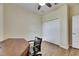 Clean bedroom features wood floors, ceiling fan and closet at 18734 Burndall Ct, Land O Lakes, FL 34638
