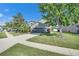 Well maintained two-story home with a lush front yard at 18734 Burndall Ct, Land O Lakes, FL 34638