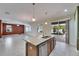 Beautiful kitchen island, perfect for entertaining with an open concept to the living area at 18734 Burndall Ct, Land O Lakes, FL 34638