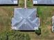 An aerial view showing roof design and how it fits in to the neighborhood at 1901 Canterbury Ln # 14, Sun City Center, FL 33573