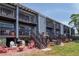 Condo with two balconies offering serene waterfront views and outdoor living spaces at 200 Meres Blvd # 7, Tarpon Springs, FL 34689