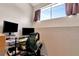 This is an office area with dual monitors, ergonomic chair, and natural light at 200 Meres Blvd # 7, Tarpon Springs, FL 34689