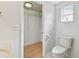 Well-lit bathroom featuring a toilet and walk-in closet at 2001 Spooner Dr, Plant City, FL 33563