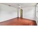 Bedroom with hardwood floors, ceiling fan and bright light at 2001 Spooner Dr, Plant City, FL 33563