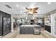 Open-concept kitchen with island seating flows into a comfortable living room with fireplace at 2087 59Th N St, Clearwater, FL 33760