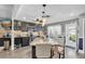 Bright, updated kitchen featuring gray cabinets, stainless appliances, and a granite island at 2087 59Th N St, Clearwater, FL 33760